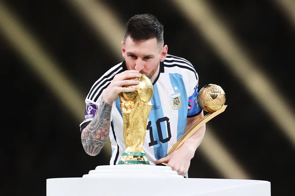 The FIFA World Cup trophy alongside graphics highlighting the officially announced prize money for the 2026 tournament winner.