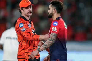 Virat Kohli and Travis Head during a tense IPL 2026 post-match moment that sparked handshake controversy discussions.
